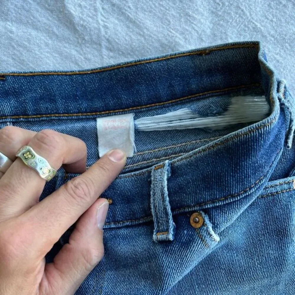 Vintage Distressed orange tab little‎ e Levis pants